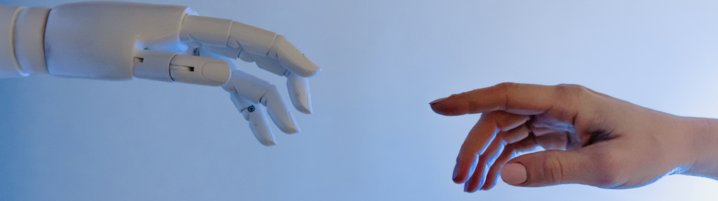 Robot hand and human had reaching for each other.