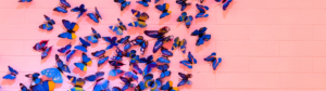 background wallpaper of blue butterflies on a pink brick wall